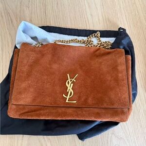 The Saint Laurent Kate Medium Reversible Chain Bag in suede and leather